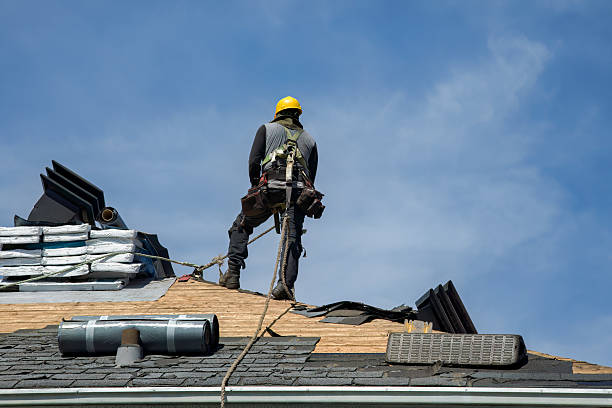 Professional Roofing technician working in Ashton, MD